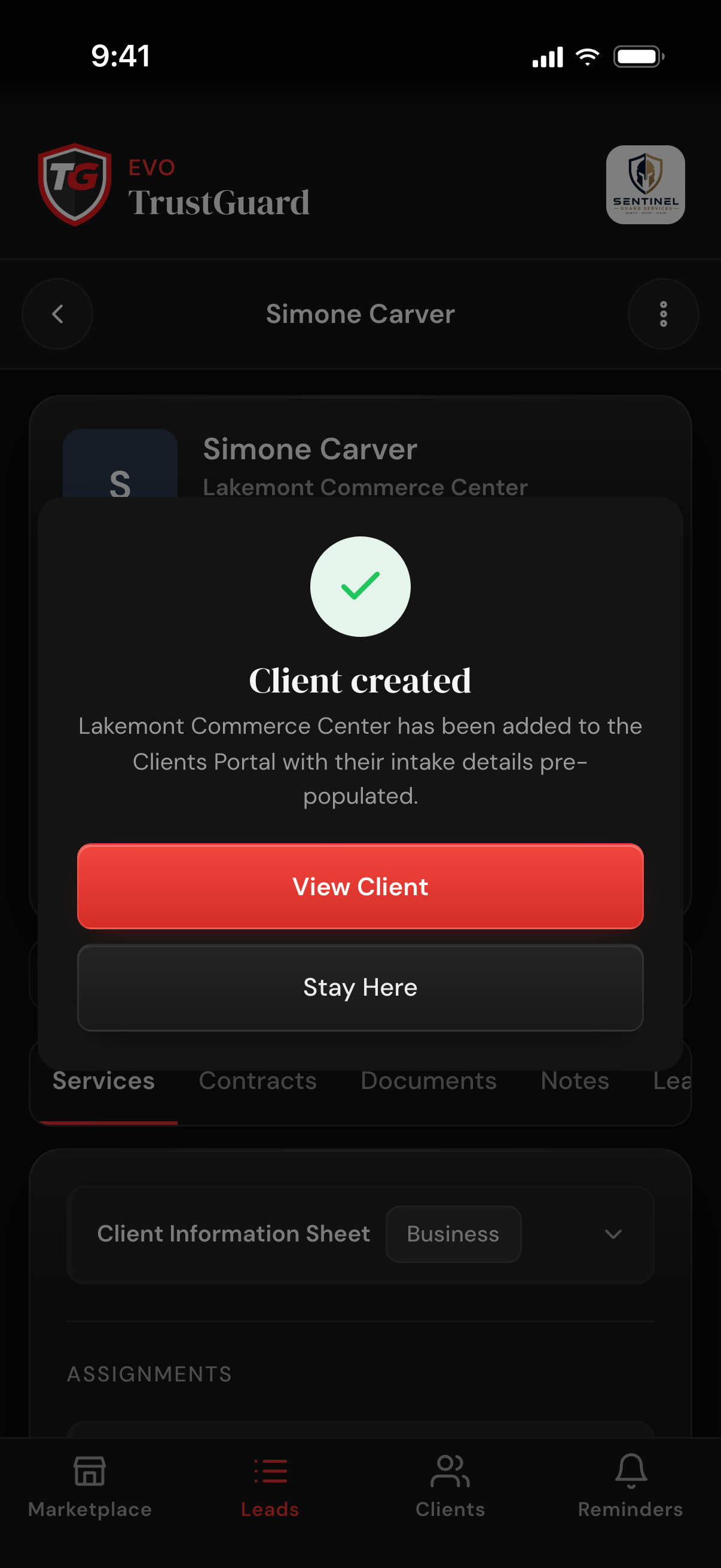 The Client created message shown after a lead is set to Hired, saying the client was added with its intake details filled in, with View Client and Stay Here buttons